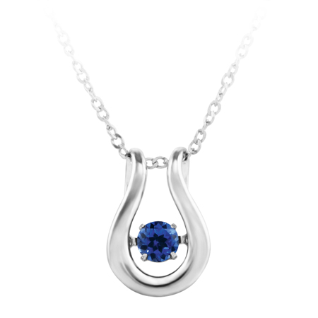  ''Dancing September Birthstone''; constant twinkling movement of a royal blue sapphire spinel set in sterling silver and furnished with an 18'' chain.
