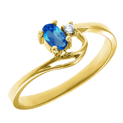 Genuine Blue Topaz 5x3 oval (December birthstone) set in 10kt yellow gold ring with .02ct round d...