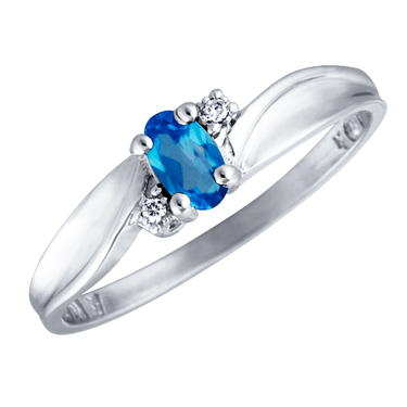 Genuine Blue Topaz 5x3 oval (December birthstone) set in 10kt white gold ring with 2 accent diamo...