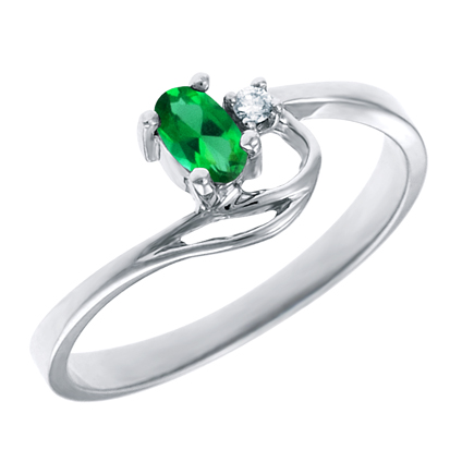 Created Emerald 5x3 oval ( May birthstone) set in 10kt white gold ring with .02ct round diamond a...