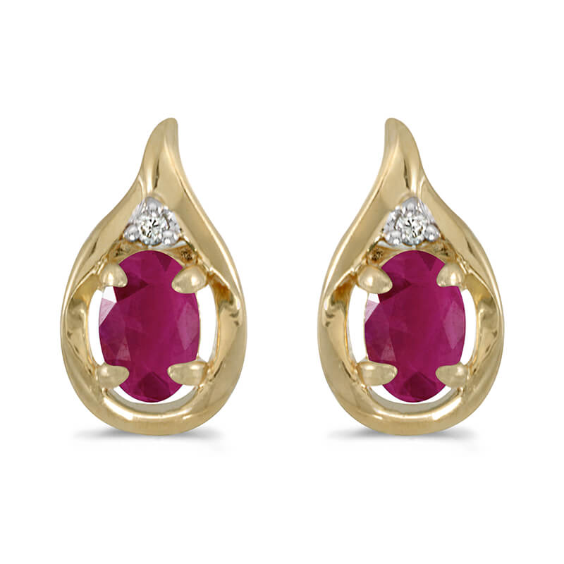 These 14k yellow gold oval ruby and diamond earrings feature 6x4 mm genuine natural rubys with a 0.72 ct total weight and .02 ct diamonds.