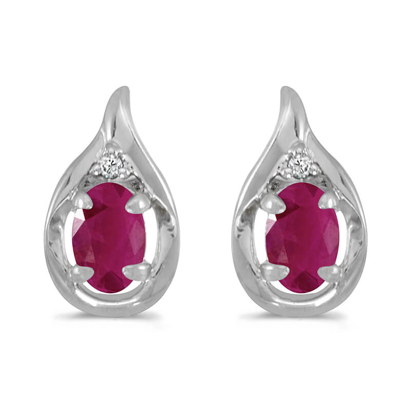 These 14k white gold oval ruby and diamond earrings feature 6x4 mm genuine natural rubys with a 0...