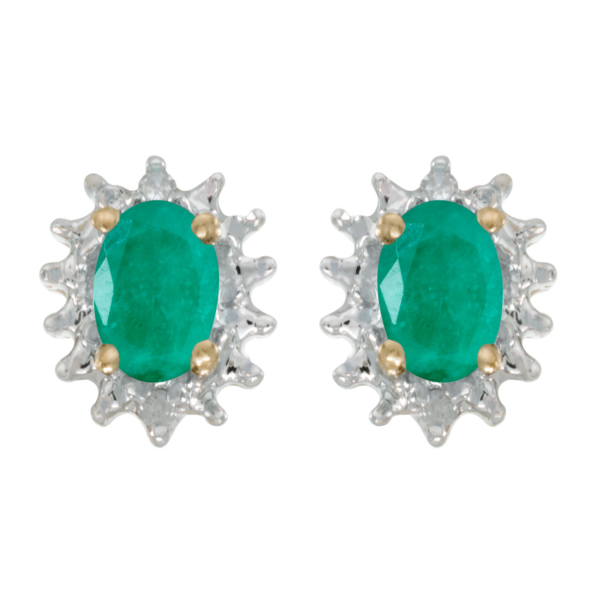 These 14k yellow gold oval emerald and diamond earrings feature 6x4 mm genuine natural emeralds w...