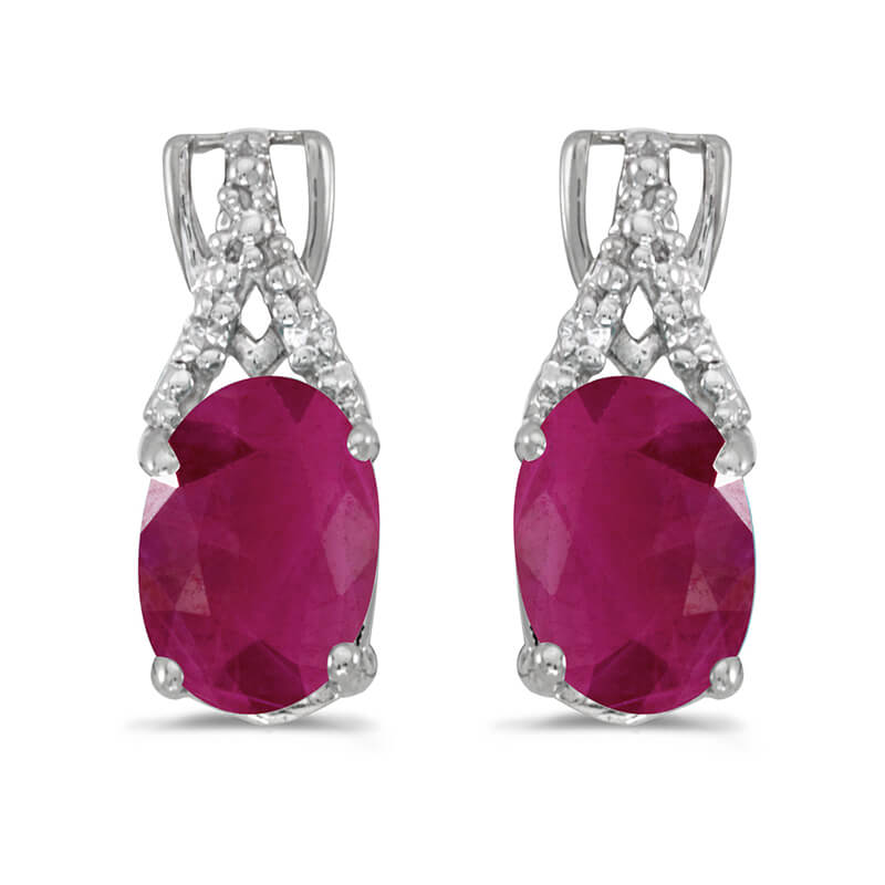 These 14k white gold oval ruby and diamond earrings feature 7x5 mm genuine natural rubys with a 1...