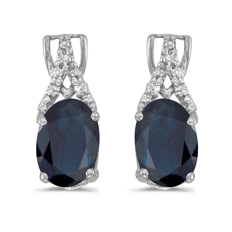 These 14k white gold oval sapphire and diamond earrings feature 7x5 mm genuine natural sapphires ...