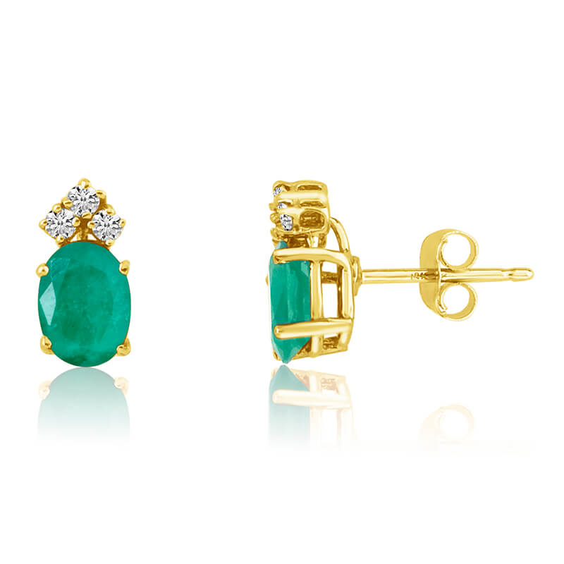These 6x4 mm oval shaped emerald earrings are set in beautiful 14k yellow gold and feature .12 to...