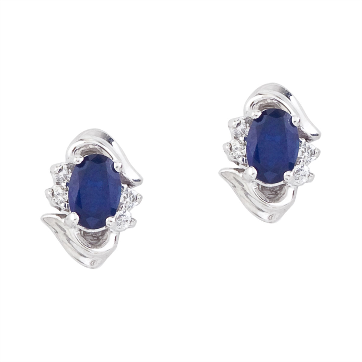 Stunning 14k white gold and sapphire earrings. Featuring natural 6x4 mm oval saphires and .11 tot...