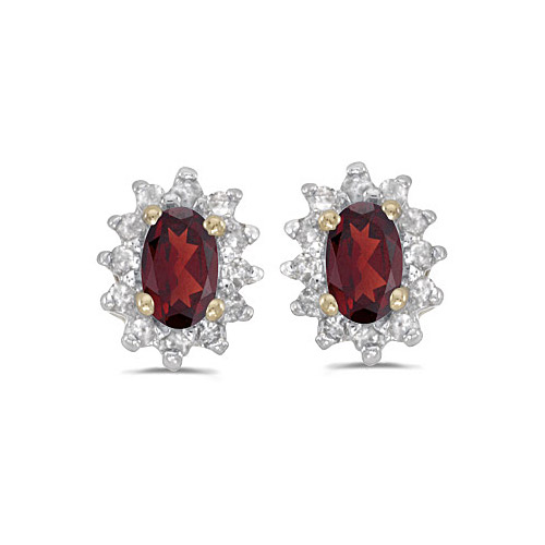 These 10k yellow gold oval garnet and diamond earrings feature 5x3 mm genuine natural garnets wit...