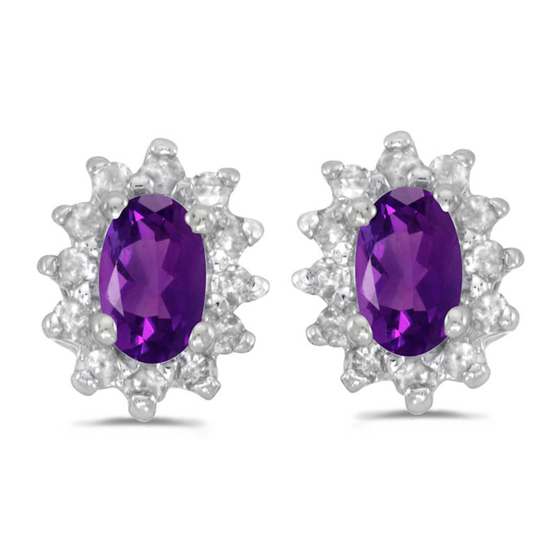 These 14k white gold oval amethyst and .25 ct diamond earrings feature 5x3 mm genuine natural ame...