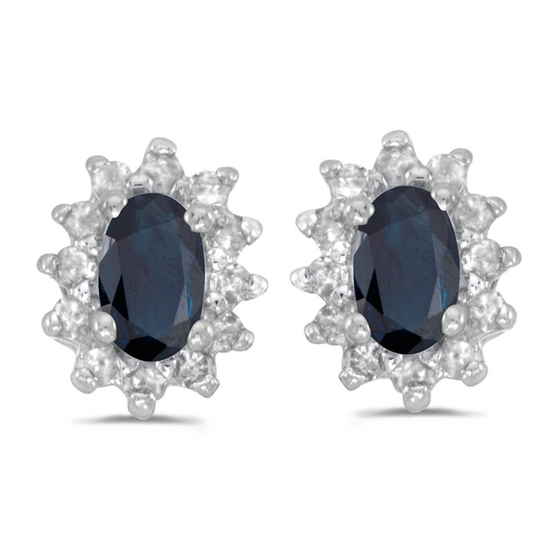 These 14k white gold oval sapphire and .25 ct diamond earrings feature 5x3 mm genuine natural sap...