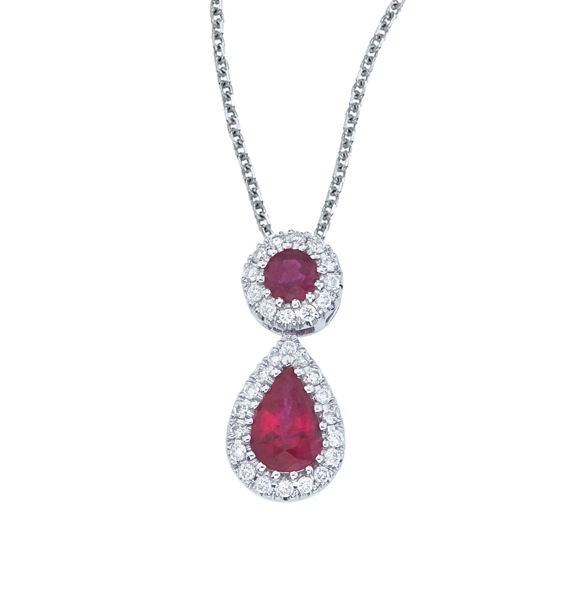 This beautiful 14k white gold pendant features a 6x4 mm ruby dangling from a 2.5 mm round ruby  all surrounded by .12 carats of shimmering diamonds.