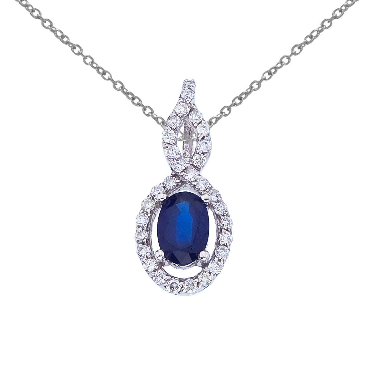 Luminous 6x4 mm sapphire pendant surrounded by .18 total ct diamonds set in 14k white gold.