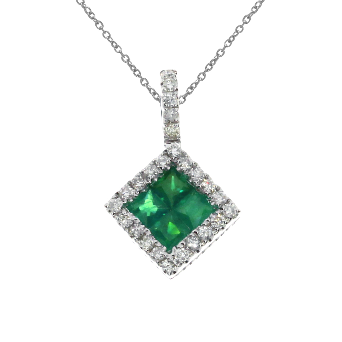 This sparkling pendant features four priness cut emeralds and .14 ct diamonds set in 14k white gold.