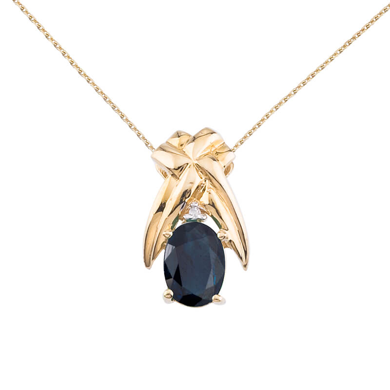 7x5 mm natural sapphire and diamond accented pendant in 14k white gold.
