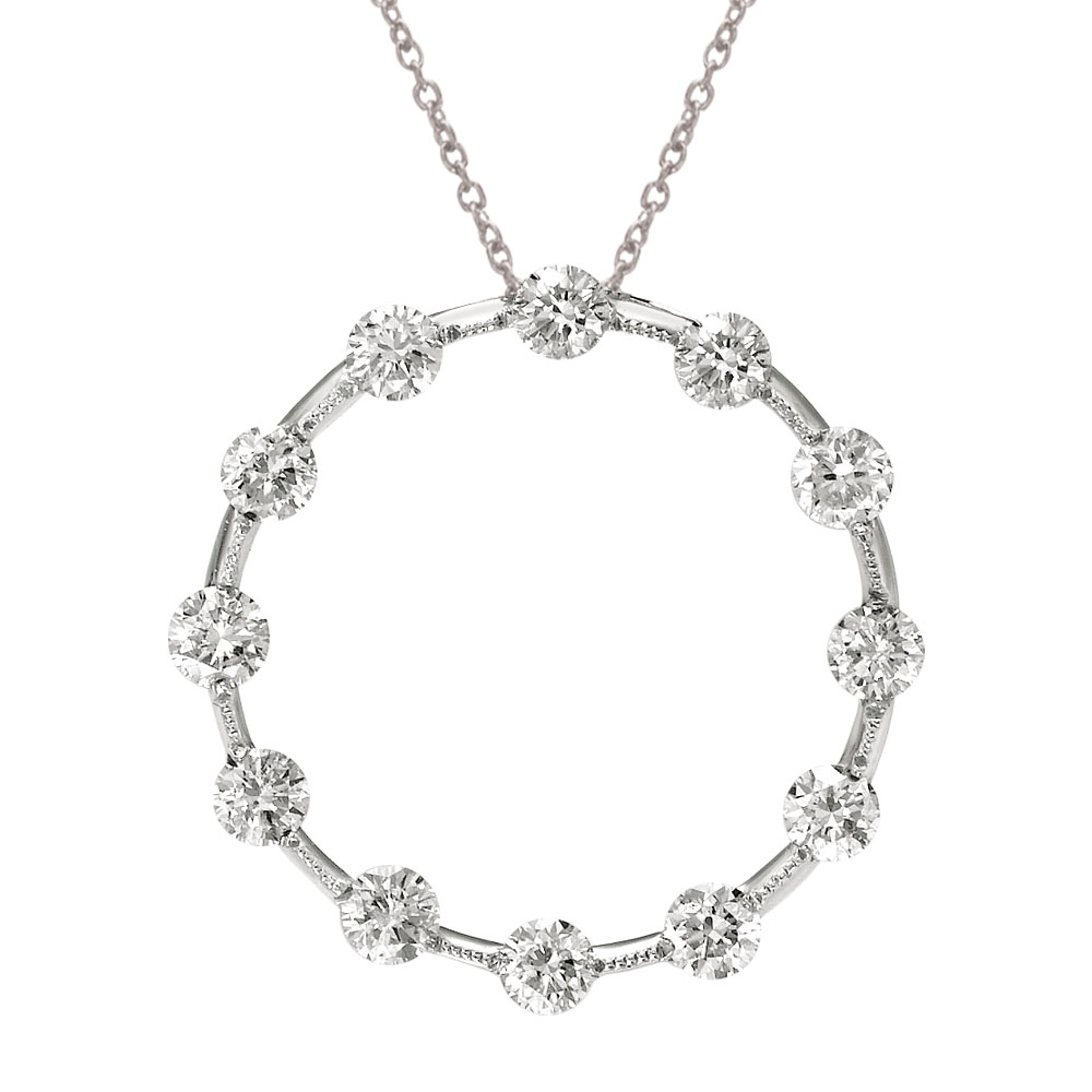 This 14k white gold pendant features a ring of brilliant diamonds (.50 ct).