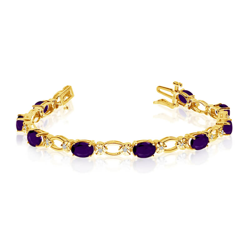 This 14k yellow gold natural amethyst and diamond tennis bracelet features 12 oval amethysts with...