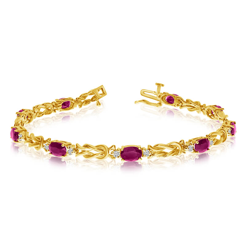 This 14k yellow gold natural ruby and diamond tennis bracelet features 9 oval rubys with a total ...