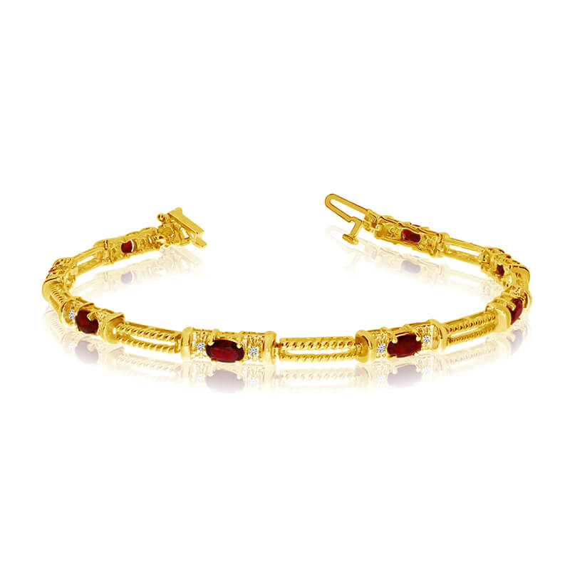 This 14k yellow gold natural garnet and diamond tennis bracelet features 8 oval garnets with a to...