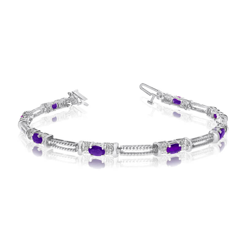 This 14k white gold natural amethyst and diamond tennis bracelet features 8 oval amethysts with a...