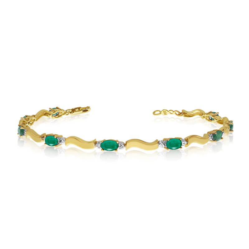 This 10K Yellow Gold oval emerald and diamond bracelet features nine 5x3 mm stunning natural emerald stones with a 2.7 ct total gem weight.