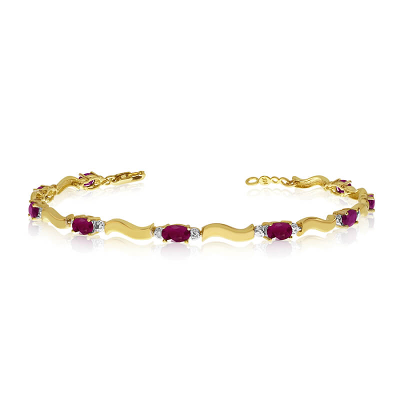 This 10K Yellow Gold oval ruby and diamond bracelet features nine 5x3 mm stunning natural ruby st...