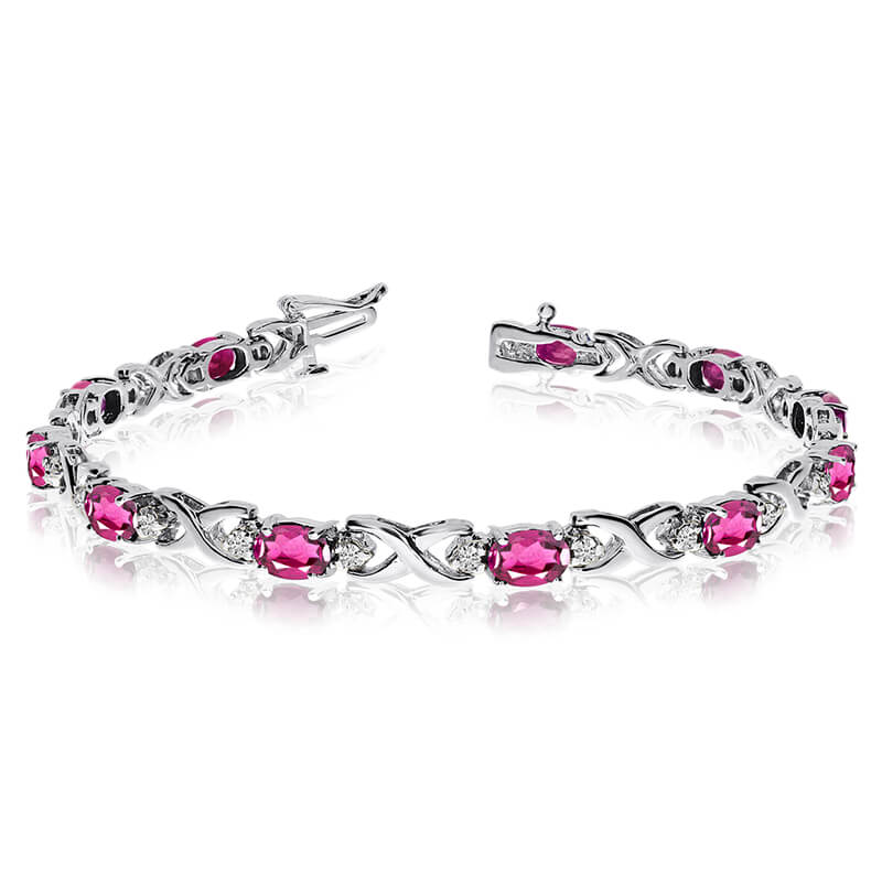 This 14k white gold natural pink-topaz and diamond tennis bracelet features 11 oval pink-topazs with a total gem weight of 4.73 carats and a total diamond weight of 0.4 carats.
