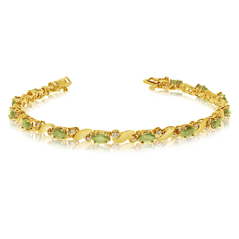 This 14k yellow gold natural peridot and diamond tennis bracelet features 13 oval peridots with a...