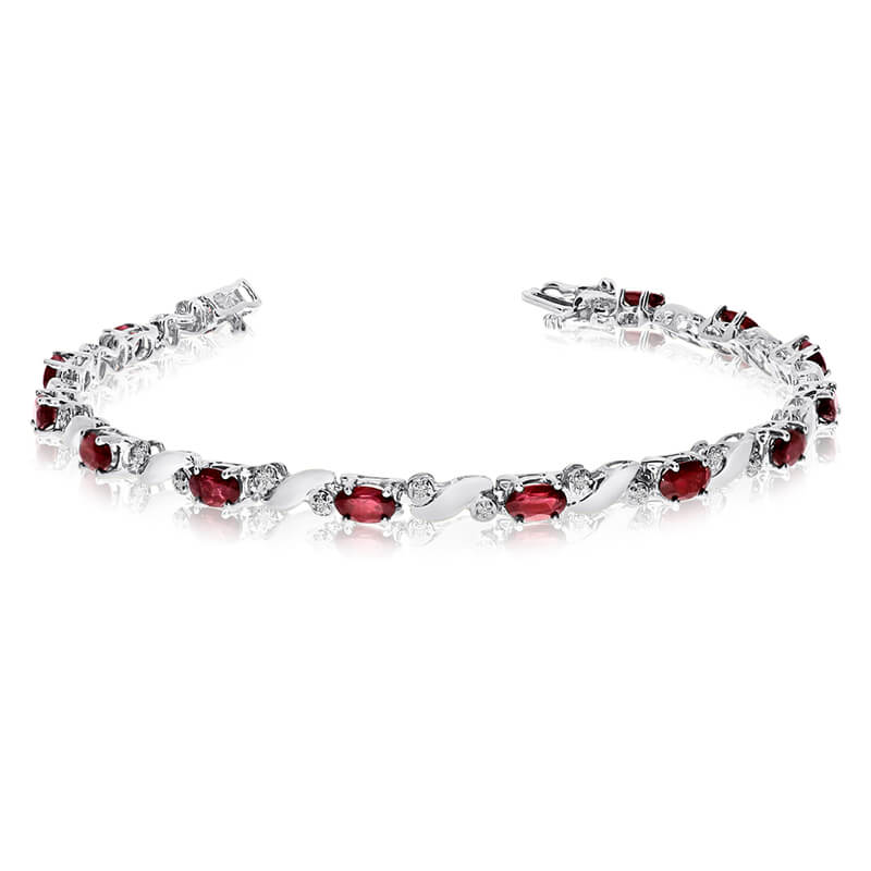 This 14k white gold natural garnet and diamond tennis bracelet features 13 oval garnets with a to...