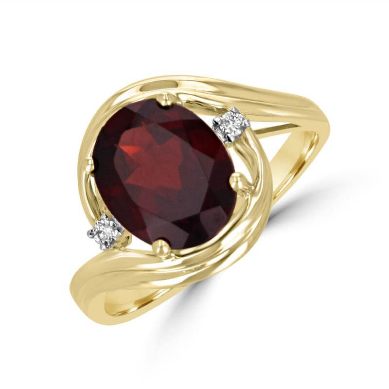 8X10 OVAL GARNET AND ONE DIAMOND ON EACH SIDE RING