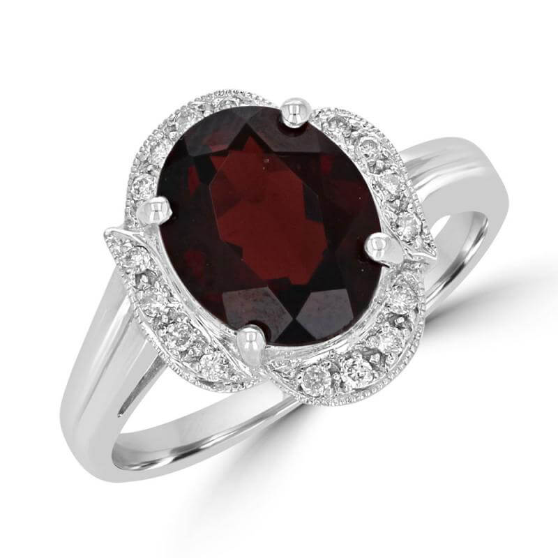 8X10 OVAL GARNET SURROUNDED BY LEAF SHAPE DIAMOND RING