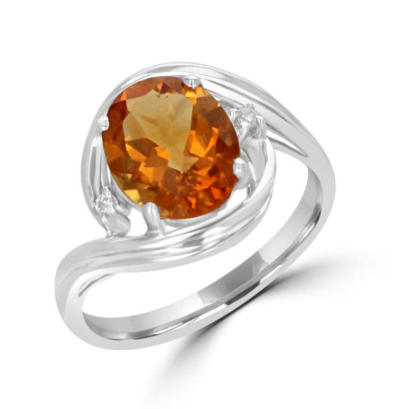 8X10 OVAL CITRINE AND ONE DIAMOND ON EACH SIDE RING