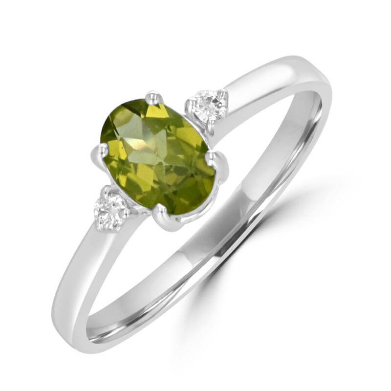 5X7 OVAL PERIDOT AND ONE DIAMOND ON EACH SIDE RING